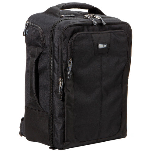 Think Tank Airport Commuter camera backpack — black carry-on bag with padded camera compartment, laptop sleeve, and side tripod straps.