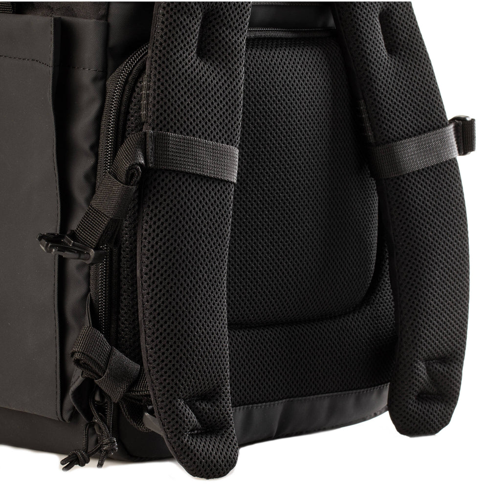 The Backpack combines vintage style with modern functionality, it offers secure camera storage, a rolltop design, and space for up to 4 lenses.