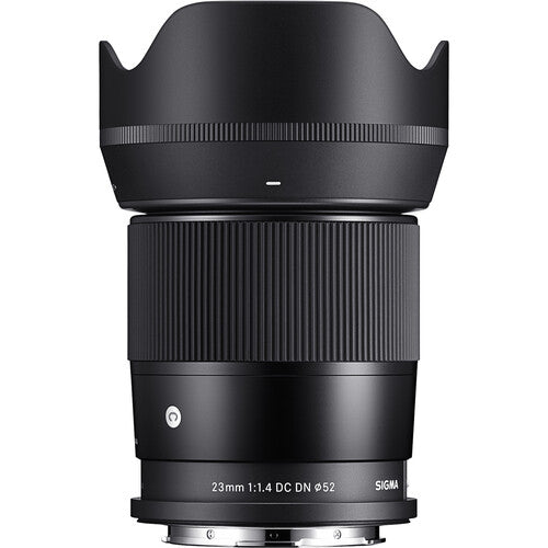Sigma 23mm f/1.4 DC DN Contemporary wide-angle prime lens for APS-C mirrorless cameras featuring bright f/1.4 aperture, advanced optics with SLD and aspherical elements, compact lightweight design, and quiet high-speed autofocus.