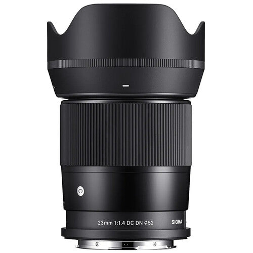 Sigma 23mm f/1.4 DC DN Contemporary wide-angle prime lens for APS-C mirrorless cameras featuring bright f/1.4 aperture, advanced optics with SLD and aspherical elements, compact lightweight design, and quiet high-speed autofocus.