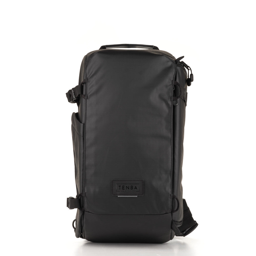 Black backpack with 'Tenba' logo on a white background