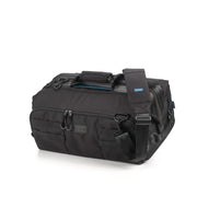 Black duffel bag with a strap on a white background