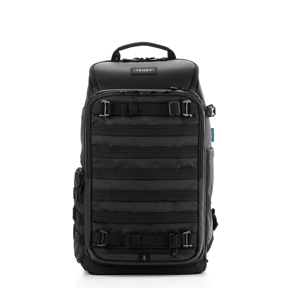 Black backpack with multiple compartments and straps on a white background
