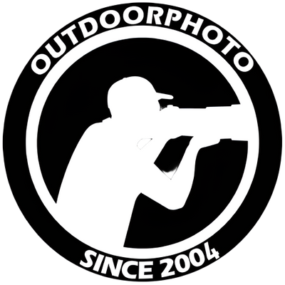 Logo of Outdoorphoto with a silhouette of a person holding a camera, set against a black background.