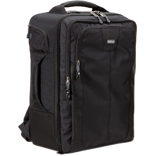 Think Tank Airport Accelerator camera backpack — black, large roll-top pack with padded dividers and side tripod mounts