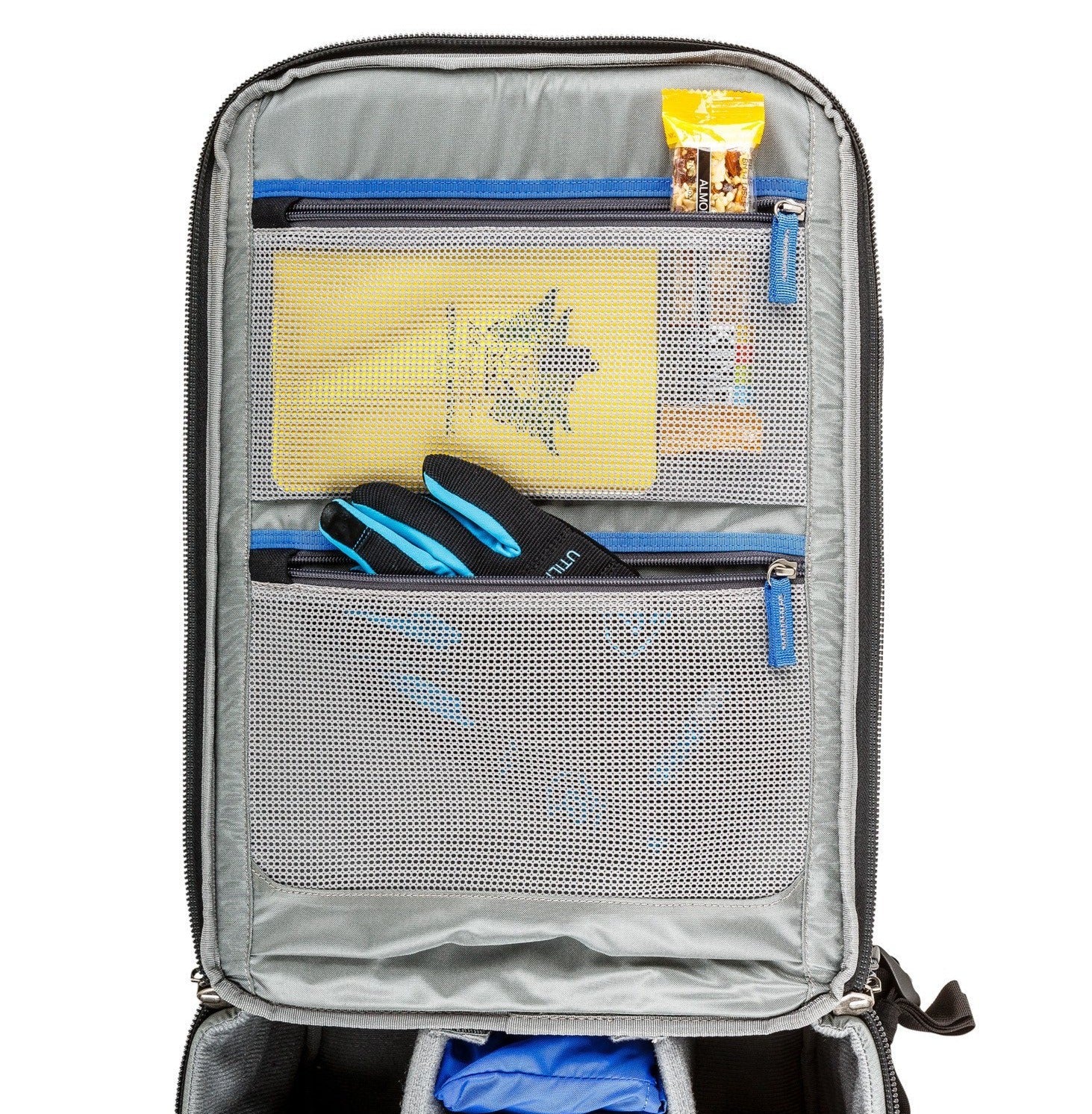 Think Tank Airport Commuter camera backpack — black carry-on bag with padded camera compartment, laptop sleeve, and side tripod straps.