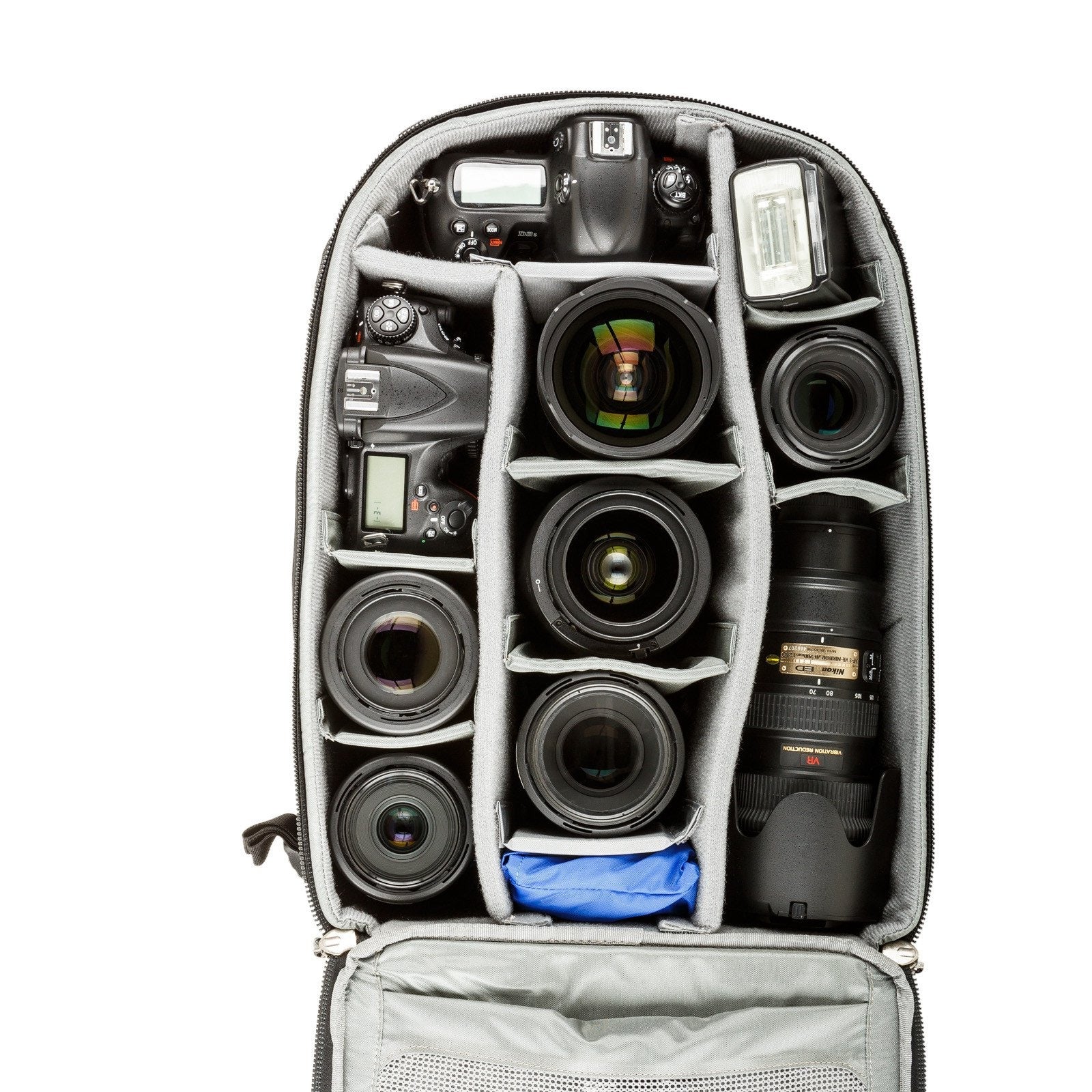 Think Tank Airport Commuter camera backpack — black carry-on bag with padded camera compartment, laptop sleeve, and side tripod straps.