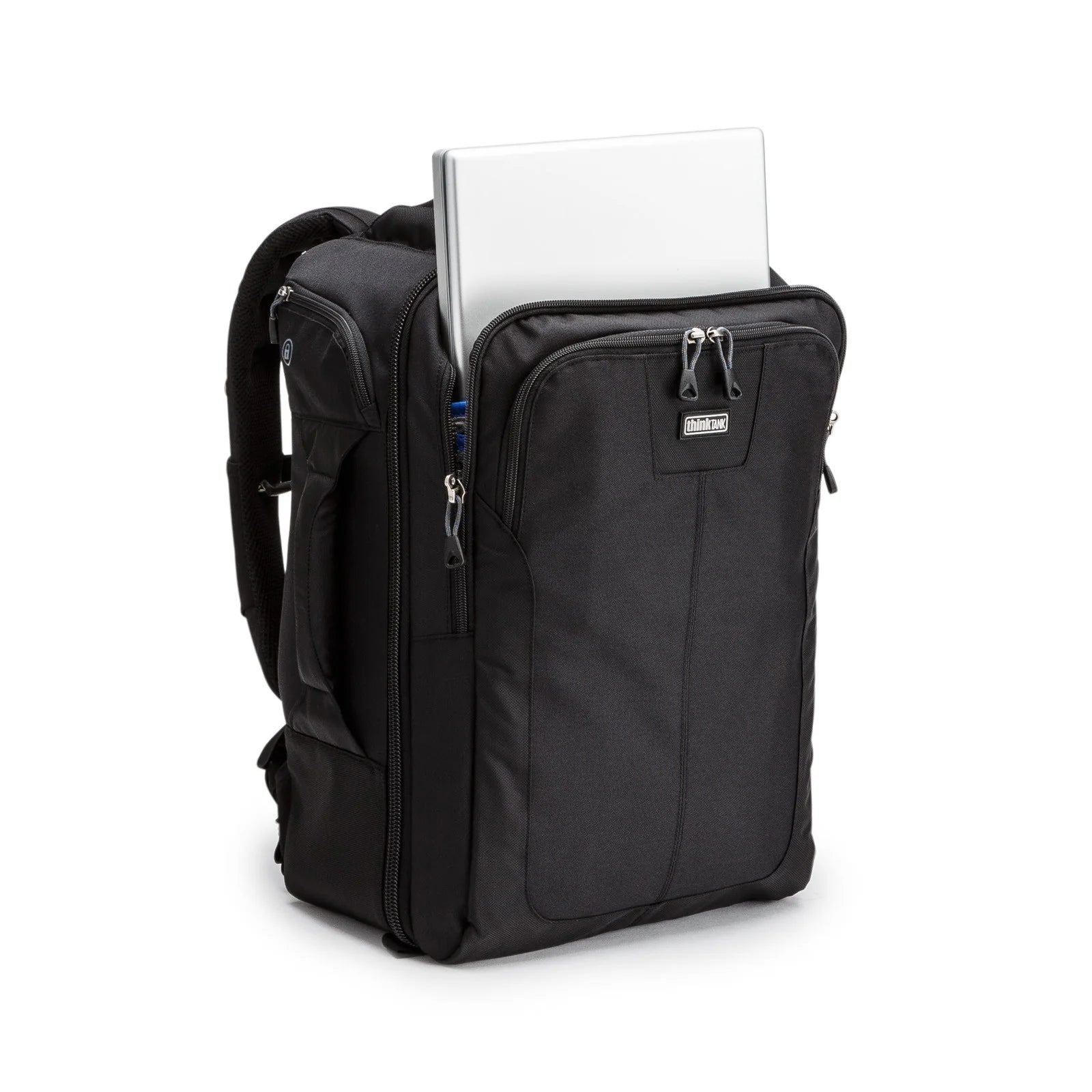 Think Tank Airport Commuter camera backpack — black carry-on bag with padded camera compartment, laptop sleeve, and side tripod straps.