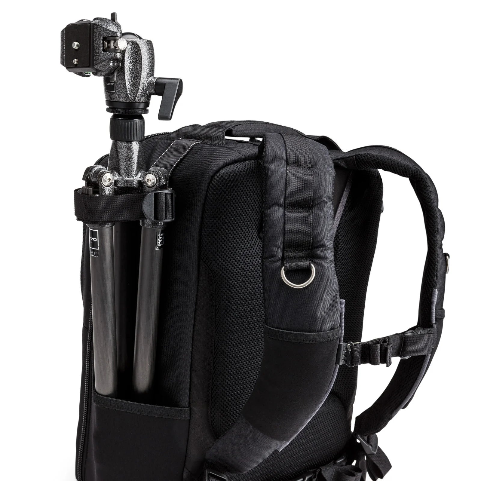Think Tank Airport Commuter camera backpack — black carry-on bag with padded camera compartment, laptop sleeve, and side tripod straps.