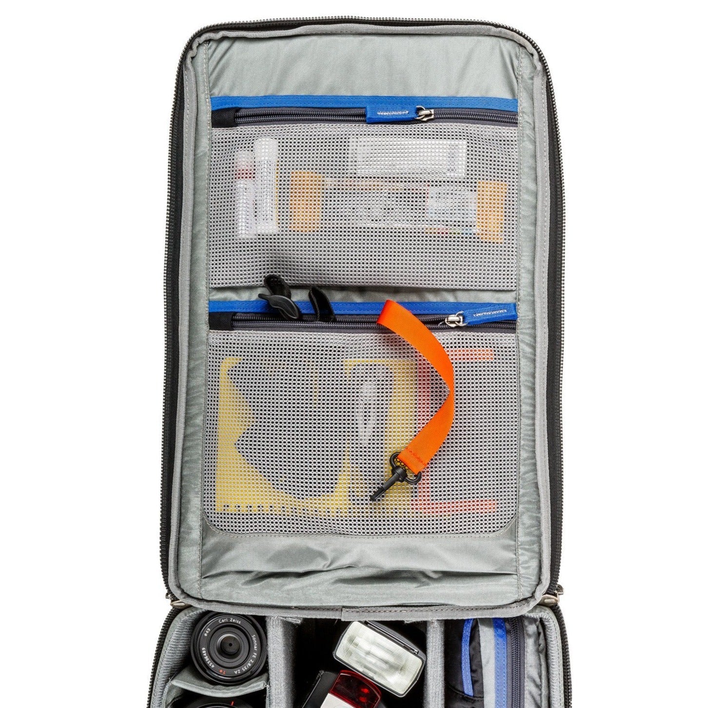 Think Tank Airport Essentials camera backpack — compact carry-on size black pack with front organizer pocket, grab handles, and laptop sleeve