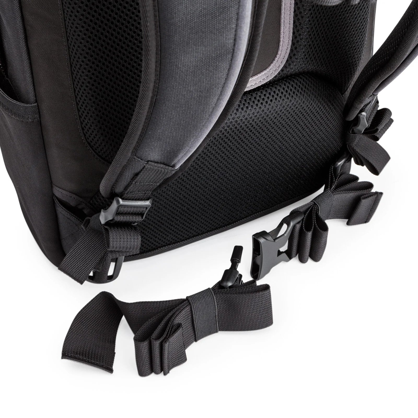 Think Tank Airport Essentials camera backpack — compact carry-on size black pack with front organizer pocket, grab handles, and laptop sleeve