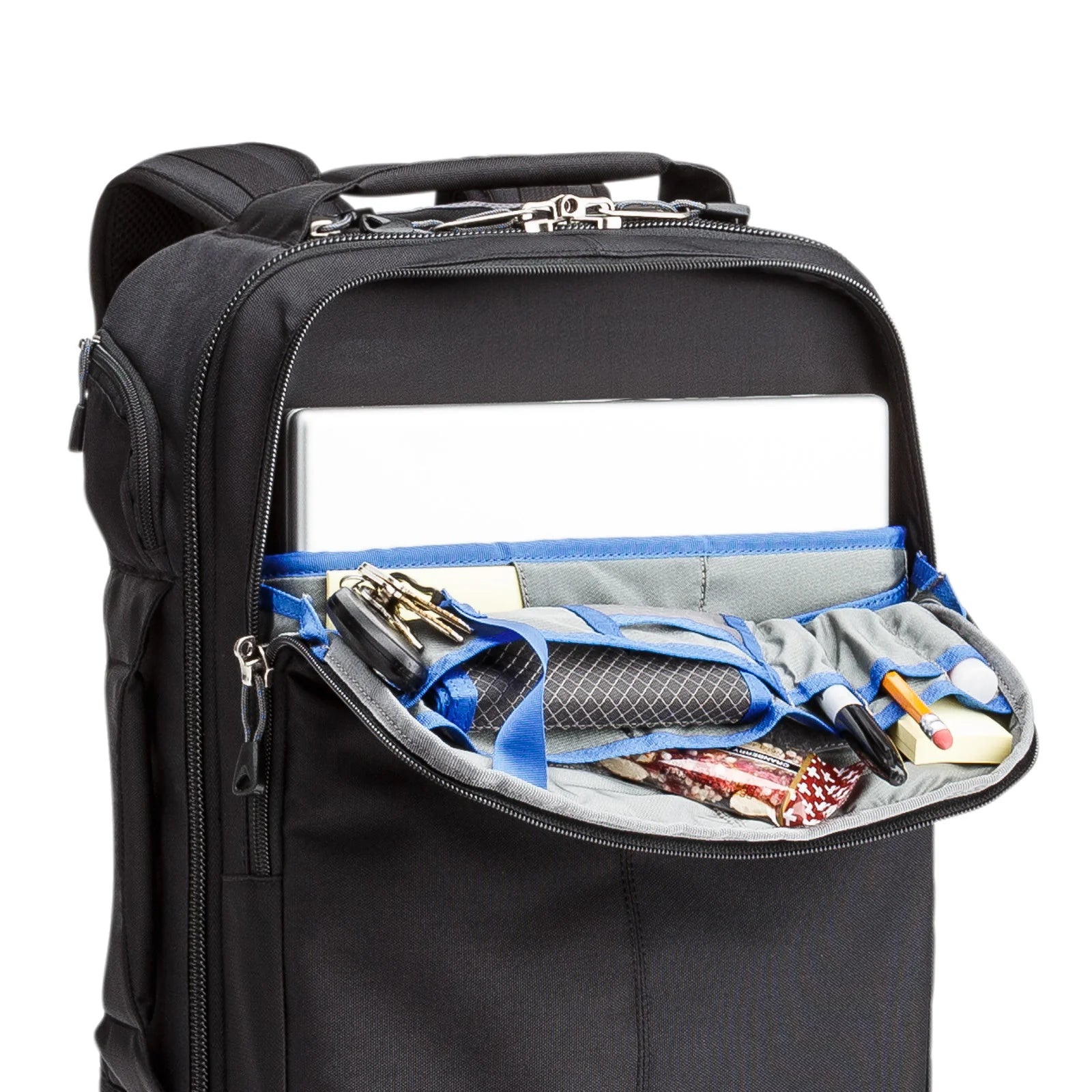Think Tank Airport Essentials camera backpack — compact carry-on size black pack with front organizer pocket, grab handles, and laptop sleeve