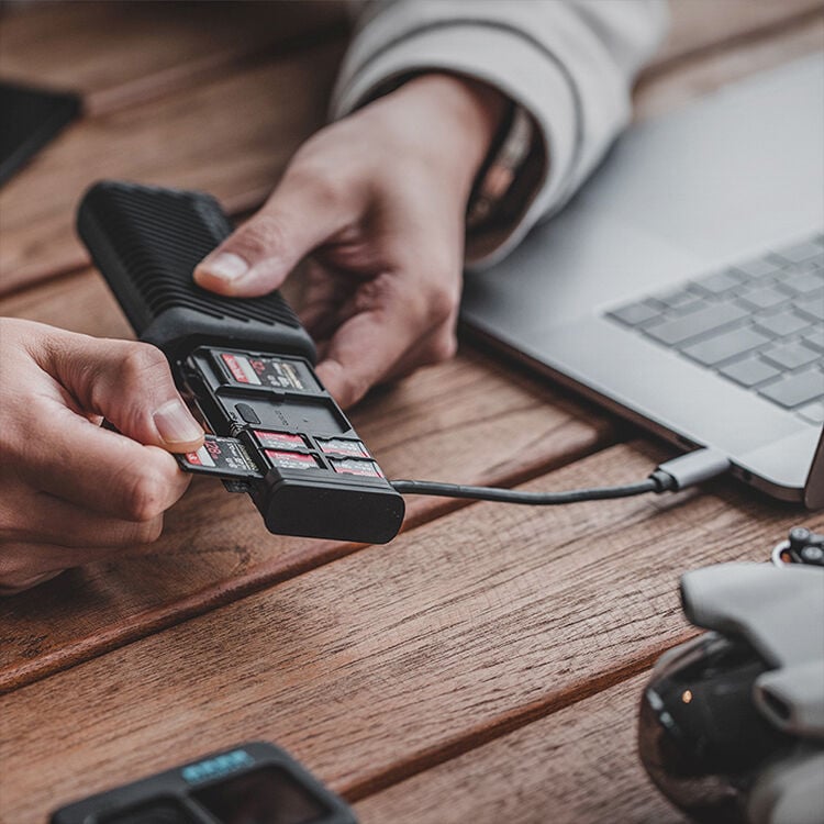 Transport memory cards and transfer data all from one card reader case. Ideal for photographers seeking convenience on the go.