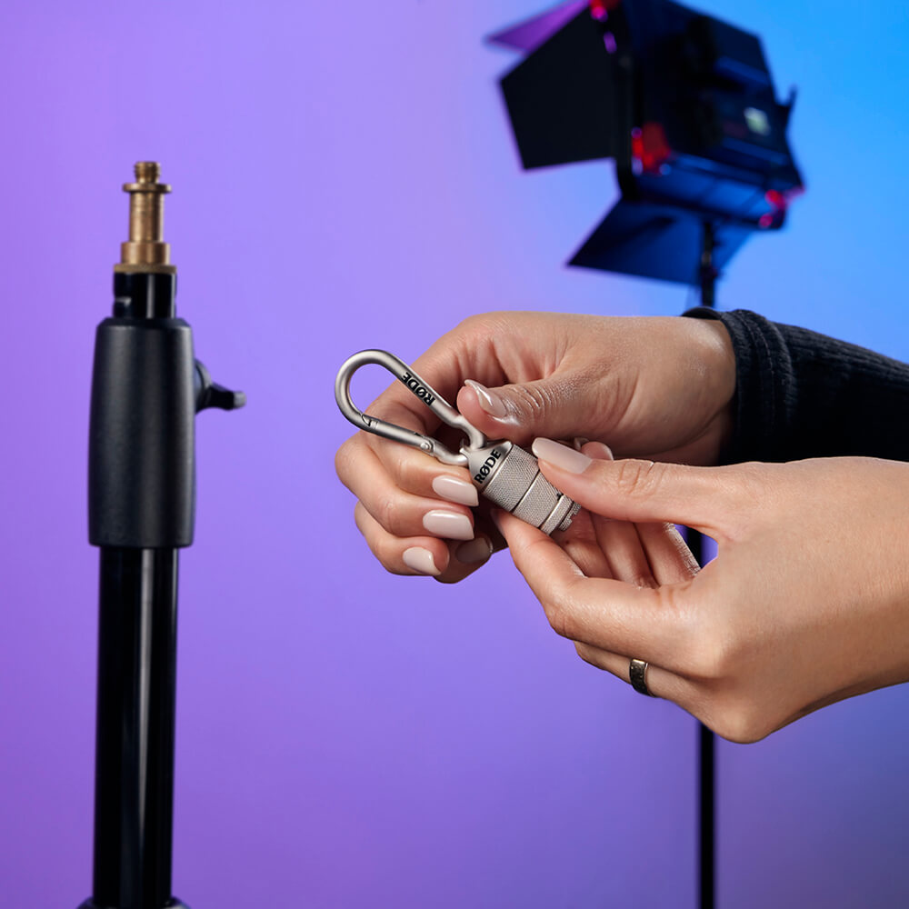 RODE Universal Thread Adaptor Kit with brass and stainless-steel thread adapters in a magnetic carabiner case.