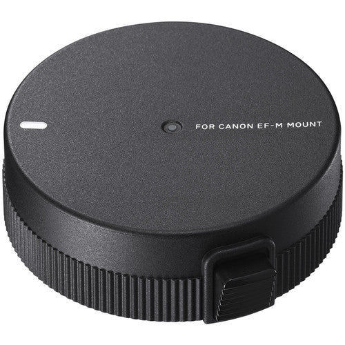 Sigma UD-11 USB Dock for Canon EF-M lenses, used to update firmware and customize focus settings via USB-C connection.