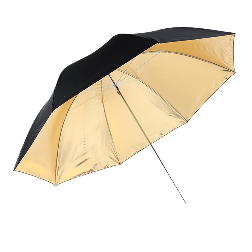 Sky umbrella 83 cm with gold interior and black exterior, providing warm reflective light.