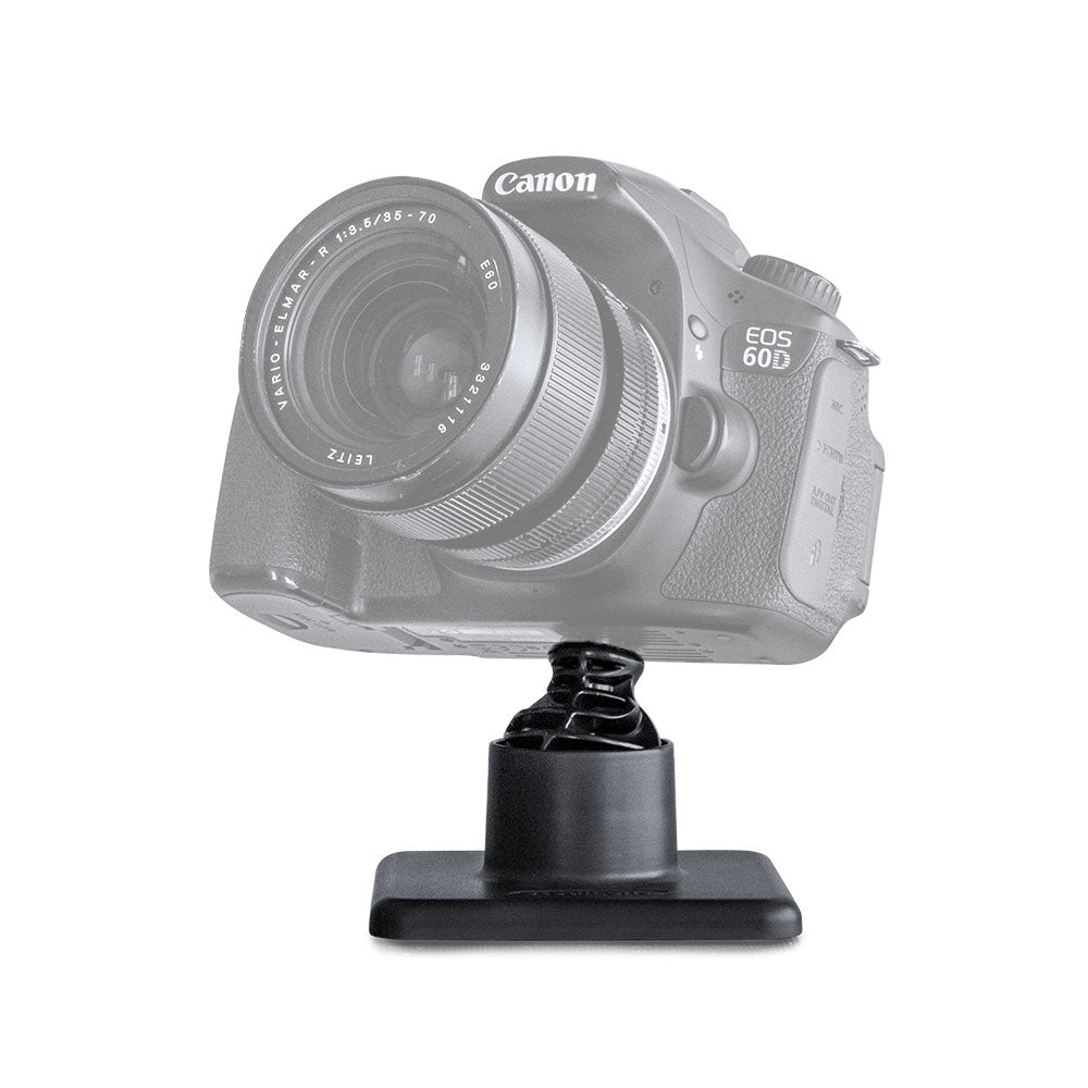 StediLens Base Unit for camera and telephoto lens stabilisation, with broad non‑slip silicone pads, compact cylindrical body and central screwball attachment point, designed for stable, gimbal‑like movement on beanbags, tripods or flat surfaces.