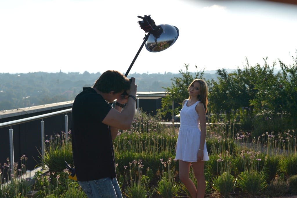 Behind the scenes shot of a photographer using the Godox lighting equipment
