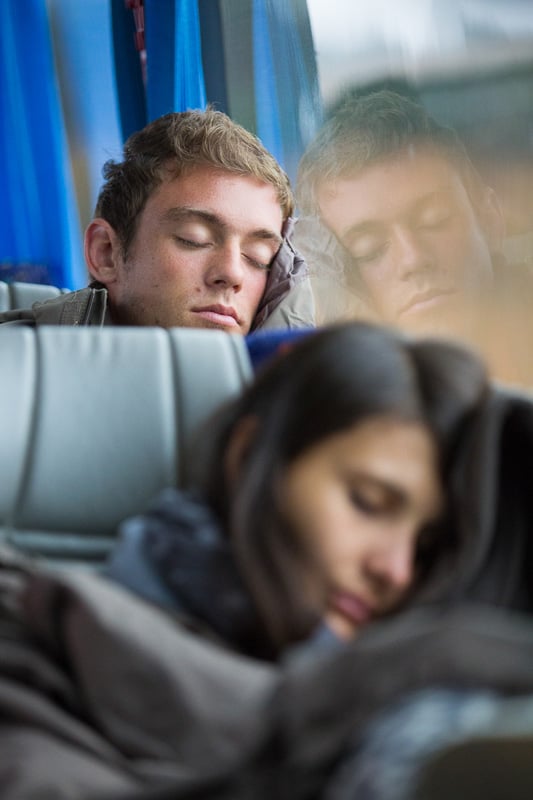 Students sleeping on the bus