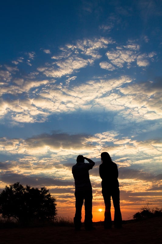 Photographers capturing a sunset at Swartbas campsite