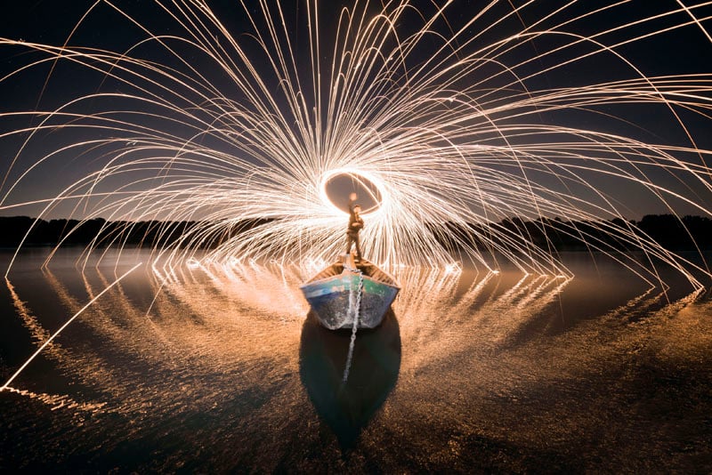 Photograph of a boat and sparkles