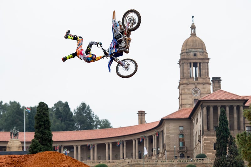 A photograph of an X-Fighter rider doing a trick at the Union Buildings in South Africa