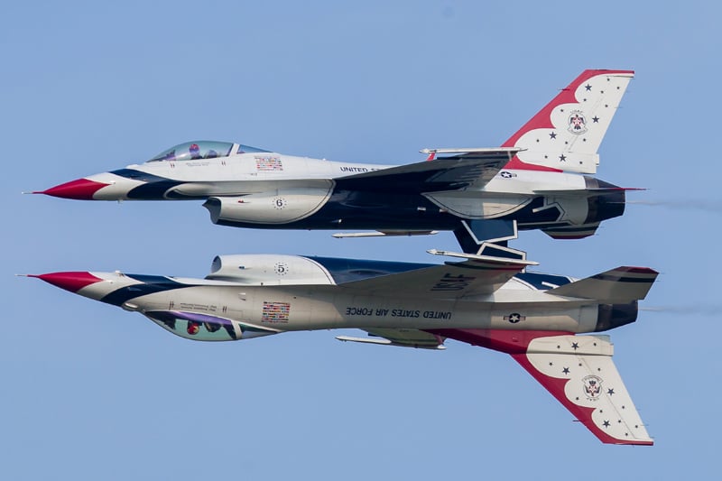 An air-to-air photograph of two jets flying close together