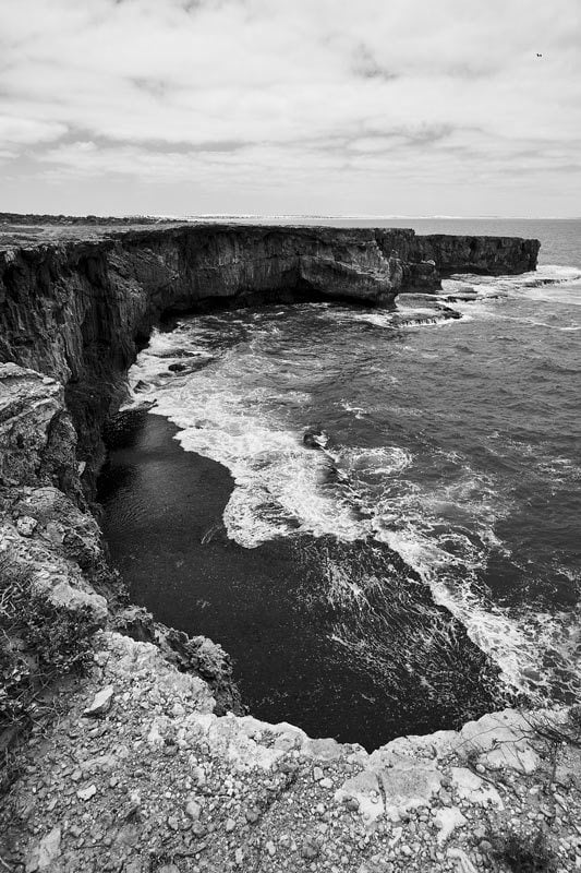 Black and White Landscape image of ridge at sea
