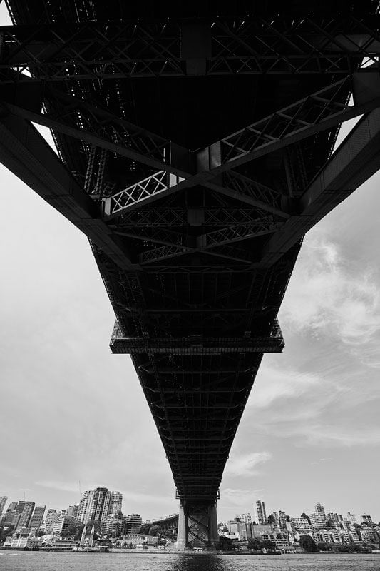 Black and white image from under bridge