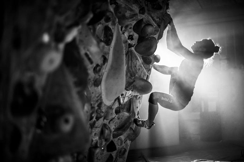 Extreme sports photograph of an athlete on a bouldering wall