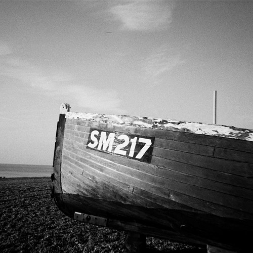 monochrome boat on beach