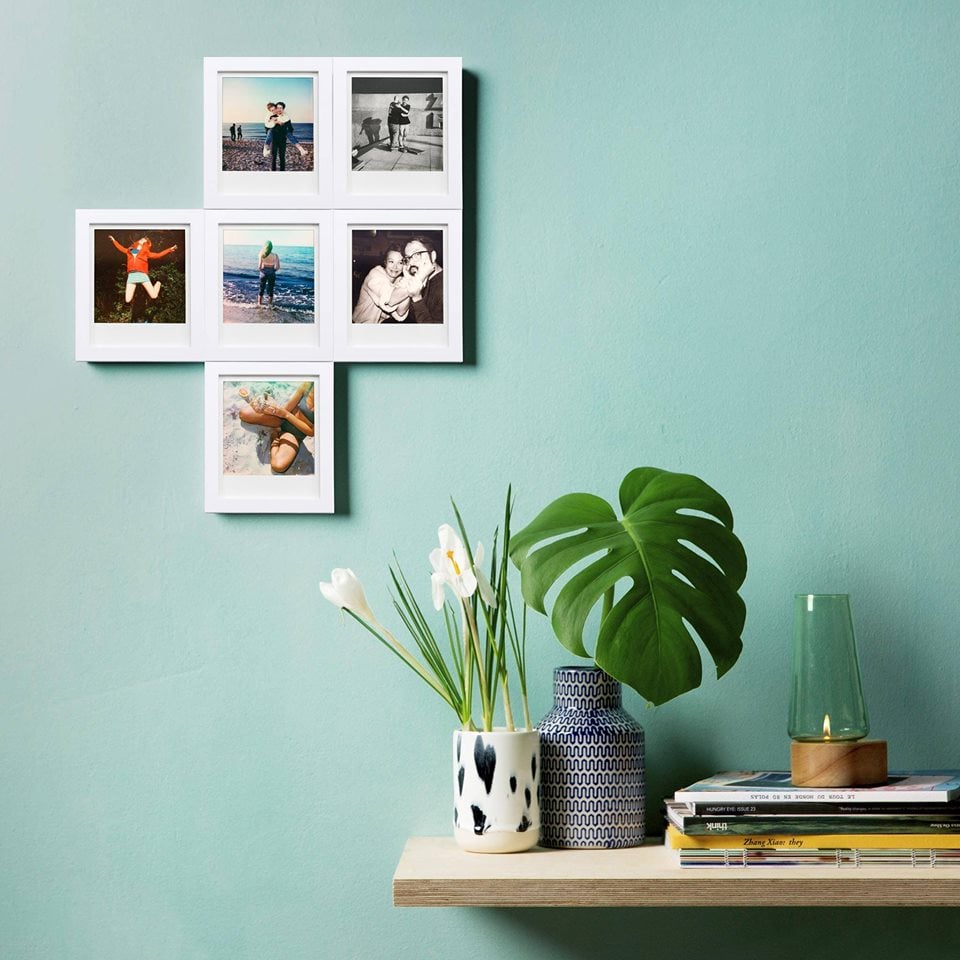 Polaroid pictures in a frame Polaroid pictures in a frame