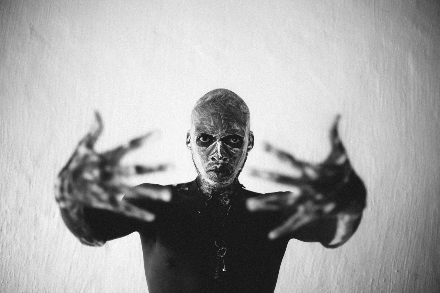 A South African man showing raw, complex emotion. Photograph by Nicholas Rawhani.