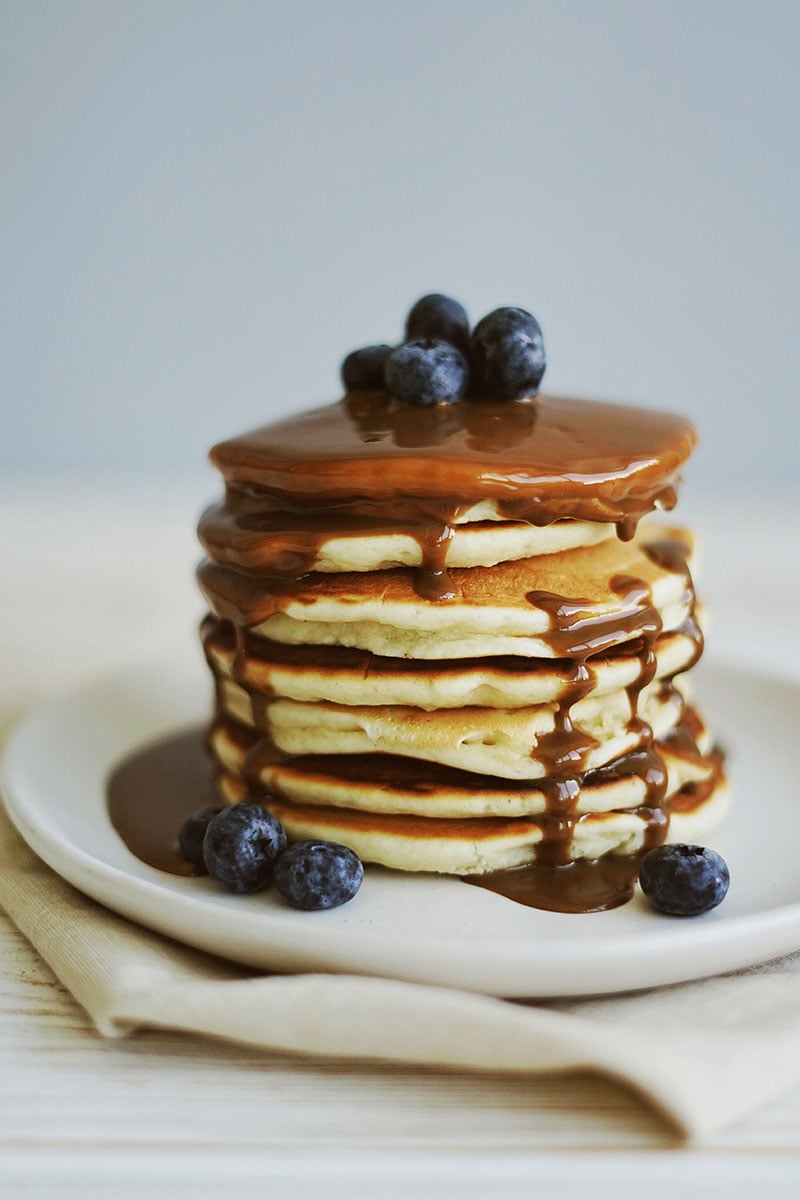 Stacked pancakes Photograph of stacked pancakes wit chocolate and blueberries