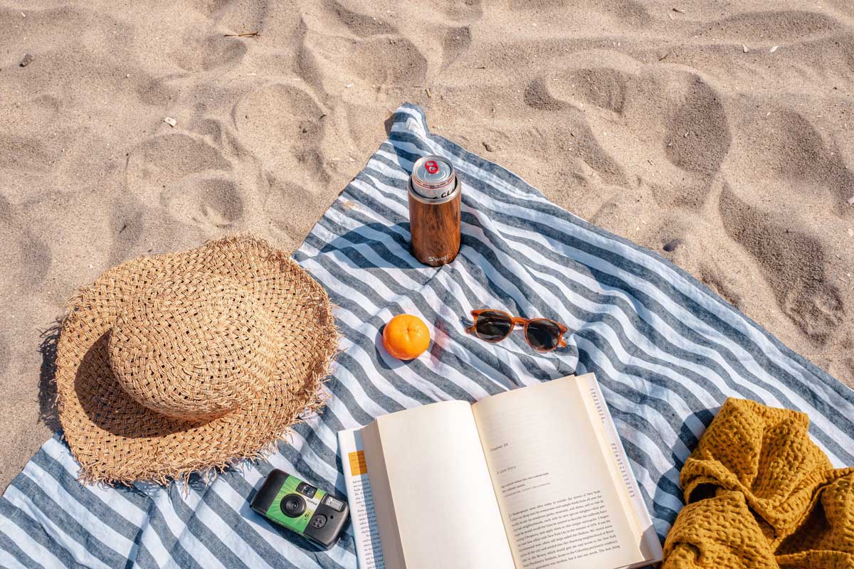 Summer vacation Summer holiday essentials on the beach