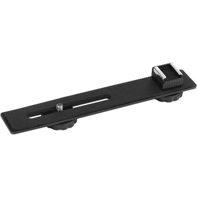 Black camera accessory on a white background