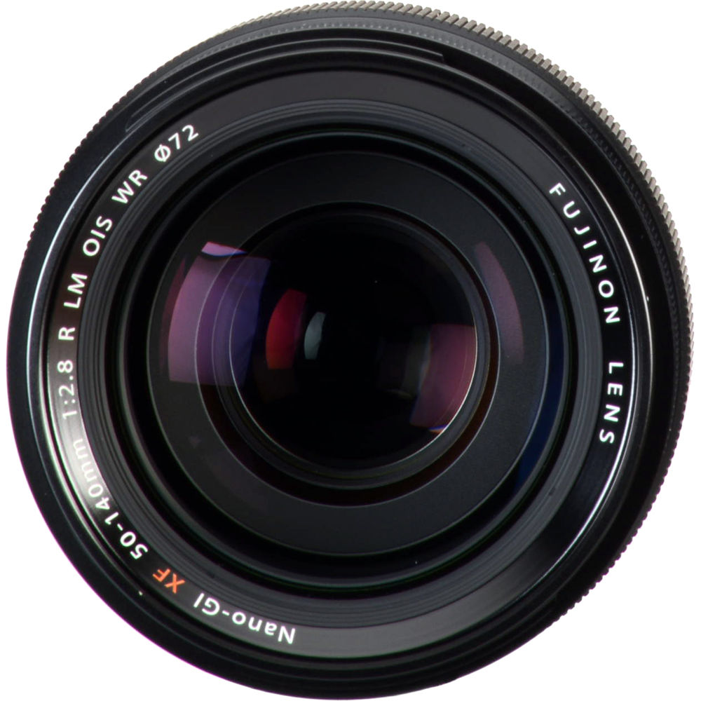 Close-up of a Fujifilm camera lens on a white background
