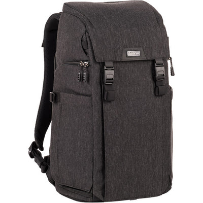 Think Tank Urban Access 15 camera backpack — black pack with side-loading panels, rear entry flap, and front tripod strap.