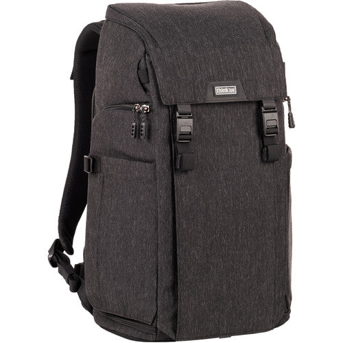 Think Tank Urban Access 15 camera backpack — black pack with side-loading panels, rear entry flap, and front tripod strap.