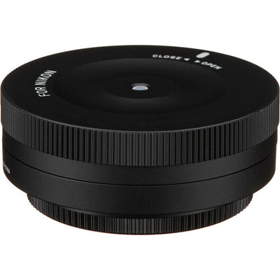 Sigma USB Dock for Nikon F-mount lenses enabling firmware updates, autofocus calibration, and customization of focus speed, focus limiters, and optical stabilization via Sigma Optimization Pro software.