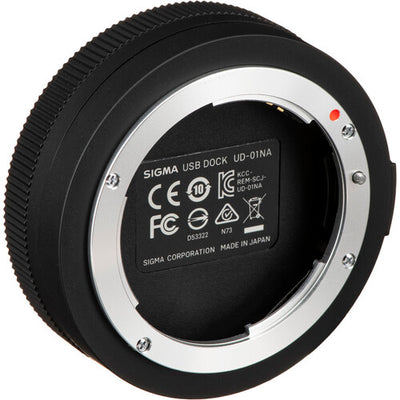 Sigma USB Dock for Nikon F-mount lenses enabling firmware updates, autofocus calibration, and customization of focus speed, focus limiters, and optical stabilization via Sigma Optimization Pro software.