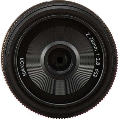 Nikkor camera lens on a white background
