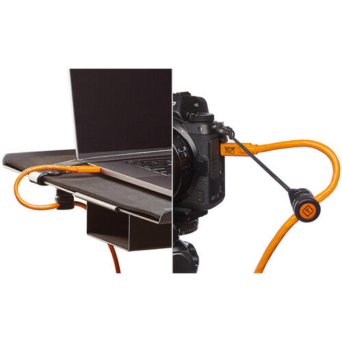 Tether Tools TetherGuard Camera Support attached to camera with tether cable.