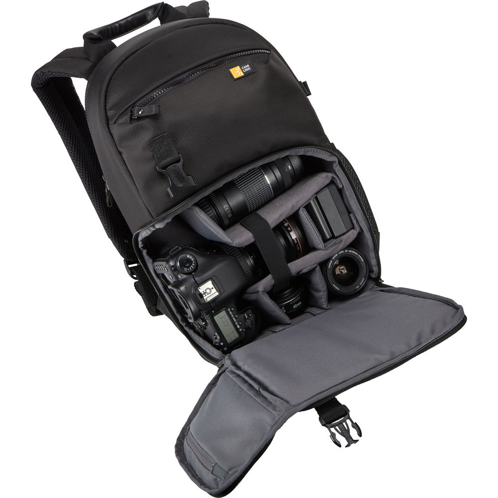Black camera backpack with compartments for camera equipment on a white background