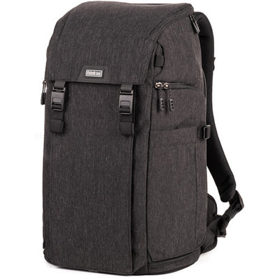 Think Tank Urban Access 15 camera backpack — black pack with side-loading panels, rear entry flap, and front tripod strap.