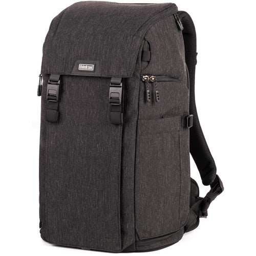 Think Tank Urban Access 15 camera backpack — black pack with side-loading panels, rear entry flap, and front tripod strap.