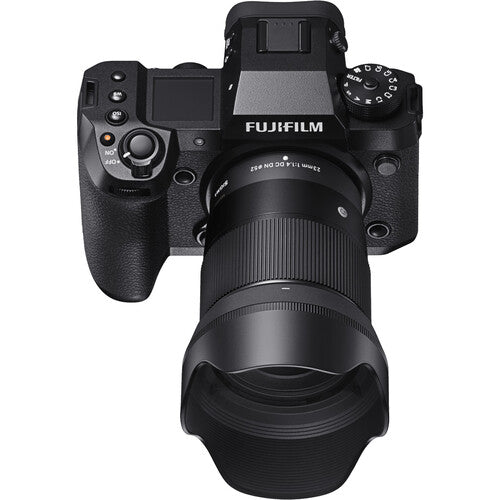 Sigma 23mm f/1.4 DC DN Contemporary wide-angle prime lens for APS-C mirrorless cameras featuring bright f/1.4 aperture, advanced optics with SLD and aspherical elements, compact lightweight design, and quiet high-speed autofocus.