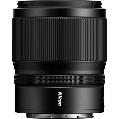 Black Nikon camera lens on a white background