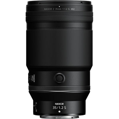 Black camera lens with 'Nikkor' branding on a white background