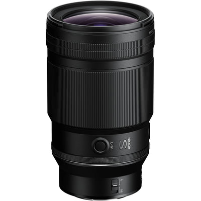 Black camera lens on a white background